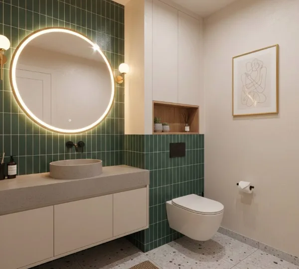 グリーンのタイルを使用した美容室のトイレの内装